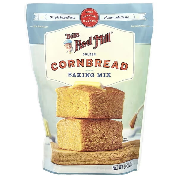 Bob's Red Mill, Golden Cornbread Baking Mix, 13 oz (368 g) front-facing product package; baking mix made with cornmeal and buttermilk powder, contains milk and wheat; recipe notes list eggs, melted butter and water for an 8-inch square pan or 12 muffins baked at 350ºF, suitable as a quick skillet cornbread or muffin base.