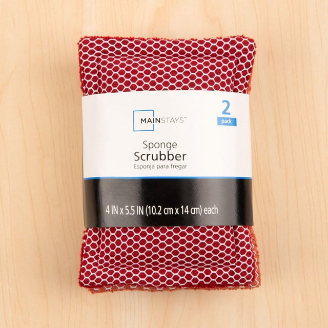 Mainstays 2 Pack Sponge Scrubbers with red hexagonal patterned 100% cotton outer shell, measuring 4 by 5.5 inches (10.2 by 14 cm) each, suitable for durable and eco-friendly kitchen and household cleaning tasks.