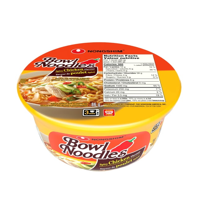 Nongshim Spicy Chicken Bowl Noodle Soup in a yellow recyclable bowl featuring a red chili pepper graphic, nutrition facts, and 3-minute microwave cooking time, containing 86 g of spicy chicken flavour ramen noodles with seasoning mix, ideal for quick convenient meals.