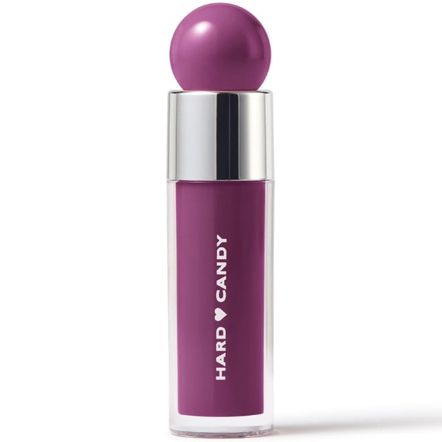 Hard Candy Glosstopia Lip Slide Creamy Lip Oil in purple, in a clear tube with a silver cap and purple spherical applicator, branded with white Hard Candy text, providing hydrating lip gloss with a smooth, glossy finish, ideal for nourishing lips with coconut oil and peptides.