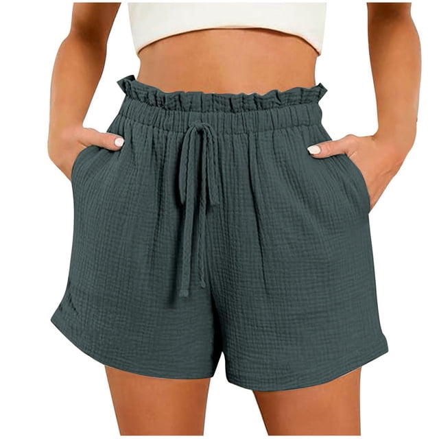 Dealovy Lounge Shorts for Women with a high elastic waistband, high-rise fit, textured fabric, and drawstring closure. These wide-leg shorts feature functional side pockets and are displayed in a dark green shade. Perfect for casual summer outings and comfortable everyday wear.