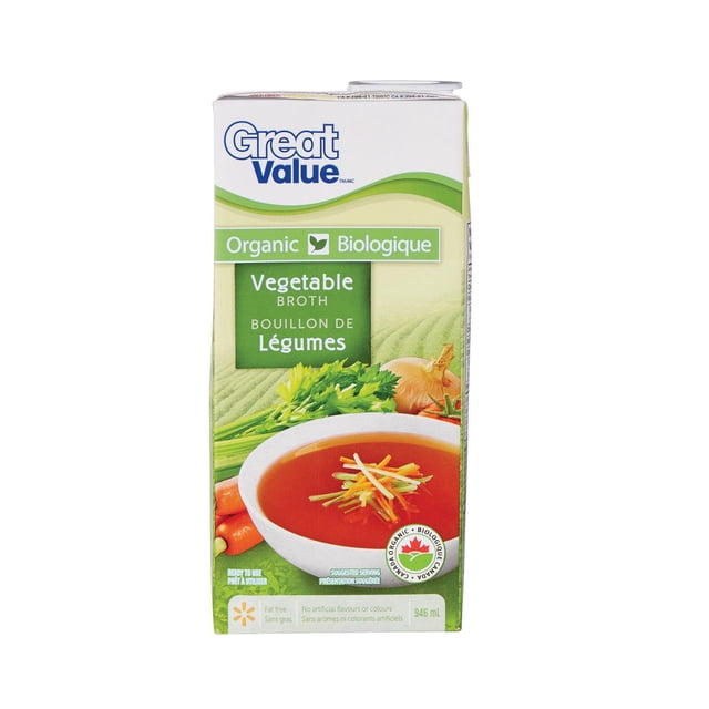 Great Value Organic Vegetable Broth 946 mL carton with bilingual English and French text, featuring a white bowl of vegetable broth garnished with shredded vegetables, fresh celery, onion, and carrots on a green background, fat free and free from artificial flavours or colours, certified Canadian organic, ideal for cooking soups and stews.