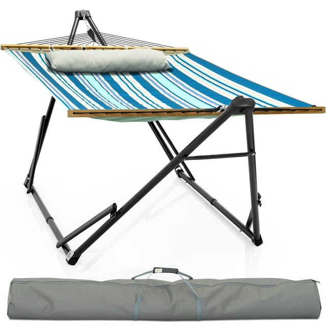 Tranquillo Unity Support de Hamac Réglable d'Une Capacité de 800 Lb, Comprenant un double Support de Hamac en Acier pour Deux Personnes. le Filet de Hamac a un Motif de Feuilles Bleues avec des Barres d'Éparpillage en Bois Franc et une Maille Douce et Respirante. le Support Est Fait d'Acier Électrostatique Enduit de Poudre avec des Pieds en Caoutchouc pour la Stabilité et des Roulements à Billes Lisses pour un Balancement Silencieux. Comprend une Conception Pliable et Rabattable pour une Installation en 30 Secondes et un Sac de Transport pour la Portabilité. Convient