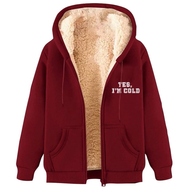 LOVZFMLL Jackets for Women's Fashionable Printed Fleece Hooded Sweatshirt Jacket in a deep red colour with a front zipper, kangaroo pockets, and a hood lined with soft beige fleece. The text 'Yes, I'm Cold' is printed on the chest. Ideal outerwear for casual occasions during winter and spring, made from lightweight polyester fiber for comfort and warmth.