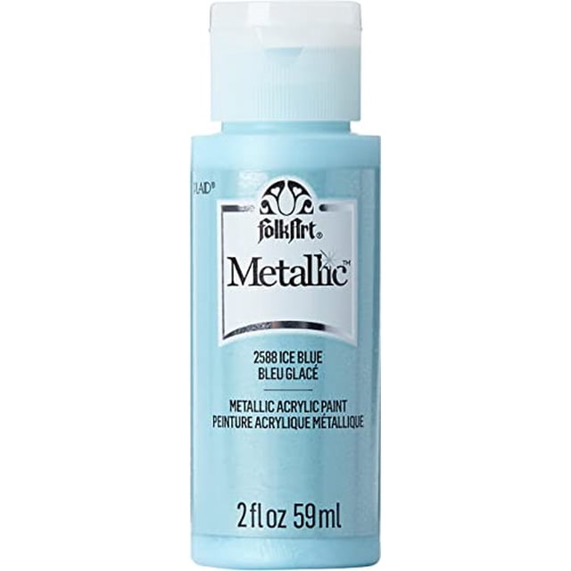 Folkart Metallic Acrylic Paint Ice Blue 2 fl oz bottle with creamy, shiny acrylic formula and white flip-top cap, labeled with brand and product details. This metallic paint provides smooth coverage and works on wood, canvas, paper, and more for versatile arts and crafts use.