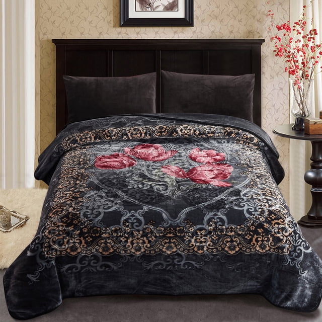 JML Gray Polyester Bed Blanket, King size, measuring 85 x 95 inches and weighing 9 lbs, displayed on a bed in a cozy bedroom setting. The plush fleece blanket features a thick Raschel design with embossed floral patterns in vibrant red and intricate gray detailing, offering a luxurious and warm appearance. Made of 100% polyester, it is wrinkle-resistant, shrink-resistant, and easy to care for. Ideal for use as a blanket or throw during autumn and winter.