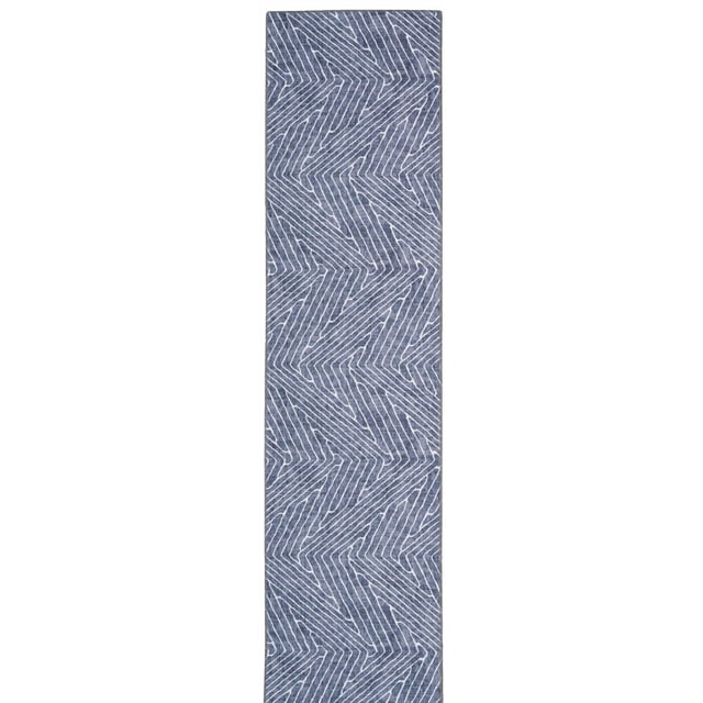 Fuller 2' x 8' washable runner rug in grey and ivory with a geometric zigzag pattern of white lines on a grey polyester surface, featuring a nonslip backing and machine washable design ideal for hallways, kitchens, or laundry rooms.