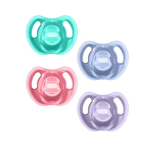 Tommee Tippee Ultra-Light Silicone Pacifier, Symmetrical One-Piece Design, BPA-Free Silicone Binkies, 18-36m, 4 Count Front-facing view of four ultra-light, reversible one-piece silicone pacifiers for 18–36 months with vented curved shields and symmetrical baglets on a white background.