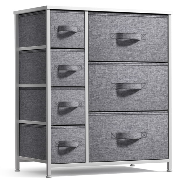 7 Drawers Chest Dresser - White with a steel frame and MDF wood tabletop. Features seven charcoal grey fabric drawers with built-in carry handles for soft-closing storage. Perfect for organizing kids' clothing, toys, and household items. Suitable for bedrooms, nurseries, or dorms. Measures approximately 25” L x 11.87” W x 28.75” H. Decorative accessories not included.
