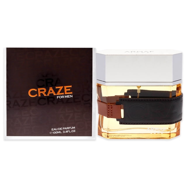 Craze by Armaf pour Hommes - Vaporisateur EDP 3,4 oz, une Eau de cologne pour Hommes Présentée dans une Bouteille Rectangulaire avec un Bouchon Argenté et un Parfum Teinté Ambre. la Bouteille Présente une Sangle en Cuir Noir Embossée du Nom de la Marque. l'Emballage Comprend une Boîte Foncée avec un Texte orange et Blanc Audacieux Affichant « Craze for Men ». Ce Parfum Boisé Épicé Combine Jasmin, Amande Amère, Lavande, Sauge, Ambre, Vanille, Bois de Santal, Bergamote, Héliotrope et cumin