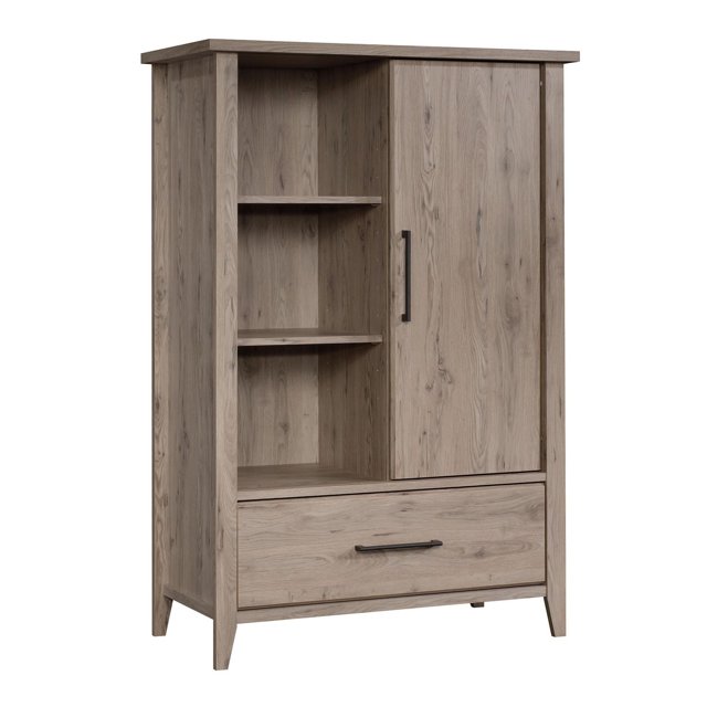 Sauder Summit Station Armoire avec Fini Chêne Laurier Neutre Léger, Pieds Fuselés et Bords Chanfreinés. Comprend une Porte Coulissante pour Rangement Dissimulé, Quatre Tablettes Ajustables et un Tiroir avec Coulisses en Métal et Butées de Sécurité. Conçue avec une construction de Panneaux Solide et Légère, Testée pour la Sécurité pour Répondre aux Normes ASTM F2057-19, et Idéale pour les Installations de Meubles de Chambre.