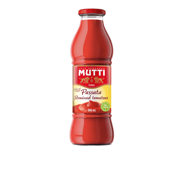 Mutti Strained Tomatoes (passata) 680ml glass bottle with red screw cap, filled with smooth bright red tomato puree. The label features the Mutti brand, Parma origin, and 100% Italian tomatoes certification, suitable for sauces, soups, and quick cooking.