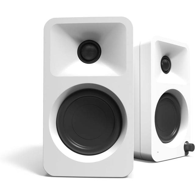 Kanto ORAMW 100W powered reference desktop computer speakers in matte white, featuring Bluetooth 5.0 and USB-C input. These bi-amplified speakers include 3-inch woofers and ¾-inch silk dome tweeters, delivering reference-quality sound. Designed with a 100 Hz automatic crossover for seamless subwoofer integration, they are ideal for creators, gamers, and musicians. The compact design fits perfectly on desktops, with inputs for USB-C, Bluetooth, and RCA connections.