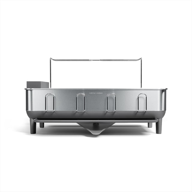 Simplehuman Kitchen Dish Drying Rack with a fingerprint-proof stainless steel frame and grey plastic accents. The rack features a swivel spout for efficient water drainage, silicone-capped wire racks to prevent scratching, and an integrated wine glass holder for up to 4 glasses. Anti-slip rubber feet provide stability, and the anti-residue coating ensures easy cleaning. Designed for modern kitchen organization.