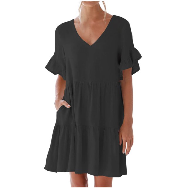 Robes Décontractées pour Femmes Robe Mini Mignonne à Col en V avec Poche Robe à Manches Courtes à Volants Robes d'Été de Plage pour Dames. Cette Robe Noire Présente un Col en V, des Manches Courtes à Volants et un design à Étages avec une Coupe Décontractée. Faite de 85 % polyester et 15 % Élasthanne, Elle Offre un Tissu Doux, Respirant et Extensible pour le Confort. Convient aux Sorties Décontractées, aux Tenues de Plage Ou aux Événements d'Été.