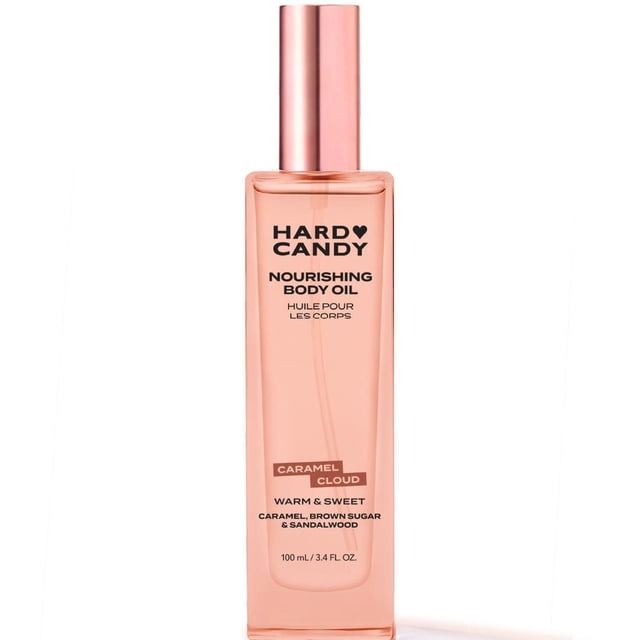 Hard Candy Nourishing Body Oil Caramel Cloud in a translucent peach rectangular bottle with rose gold pump, featuring warm caramel, brown sugar, and sandalwood scent, providing fast-absorbing hydration, 100 ml / 3.4 fl oz.