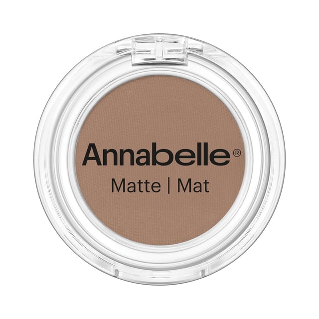 Annabelle Matte Single Eyeshadow in taupe, shown in a clear round compact with black branding, featuring a velvety matte powder texture that blends effortlessly for long-lasting, crease-free eye makeup.