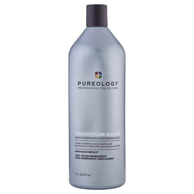 Pureology Strength Cure Revitalisant Blond 1 L dans une Bouteille Argentée Élégante avec un Bonnet Violet. Cet Revitalisant Violet Crémeux Est Conçu pour Tonifier et Fortifier les Cheveux Cuivrés, Abîmés et Éclaircis. Il Contient des Ingrédients Clés comme le Kéravis, l'Astaxanthine et des pigments Tonifiants Orchidée Violette, Accompagné d'Un Mélange Aromathérapie signature de Poire, de Rose et de Bois de Santal. la Formule Zérosulfate, 100 % Végane, Restaure la Santé et la Brillance des