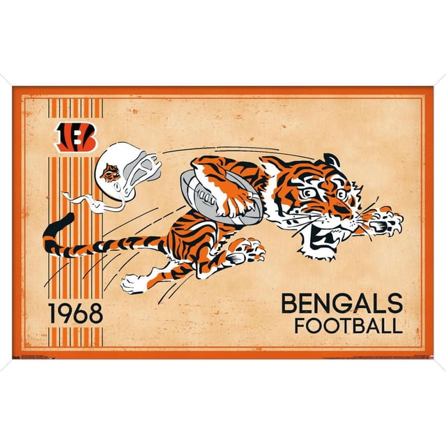 NFL Cincinnati Bengals - Retro Logo 14 Wall Poster, 22.375" x 34" depicting a vintage Bengal tiger leaping with a football, a white helmet with the Bengals logo, and the year 1968 on a beige textured background with an orange frame, suitable for sports-themed wall décor.