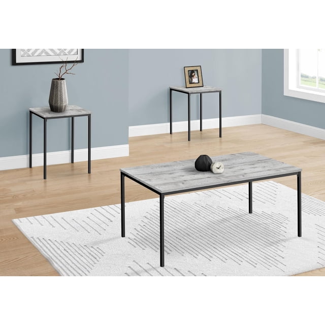 Monarch Specialties Table Set, 3pcs Set, Coffee, End, Black Metal, Grey Laminate, Contemporary, Modern featuring a rectangular coffee table and two square end tables with durable grey laminate tops and black metal frames, arranged on a white patterned rug over light wood flooring in a modern living room with blue walls. The set is ideal for everyday use and easy assembly.