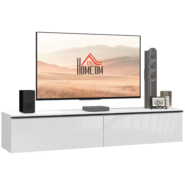 HOMCOM Meuble Télé Mural avec Rangement, Console Multimédia Flottante, Blanc. Ce Meuble Télé Moderne Présente une Finition Blanche Élégante à Fini Très Lustré et un design Mural pour Économiser de l'Espace au Sol. Il Comprend Deux Armoires Spacieuses avec Portes Rabattables pour Rangement Dissimulé et une surface Supérieure Grand pour Appareils Multimédias Ou Déco. Fabriqué en Panneau de Particules durable avec une Finition Mélamine, Il Mesure 63 Pouces de Large, 13,8 Pouces de Profondeur et 11,8 Pouces de Hauteur. Convient aux Salons Ou aux Salles de Divertissement, Supporte jusqu'à 66 Lb
