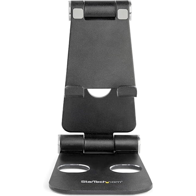 StarTech.com Foldable Phone & Tablet Stand in black with adjustable multi-angle hinges, foldable and portable design, featuring cable management cut-outs and silicone padded grips for stable, ergonomic viewing of smartphones and tablets, ideal for desk use.