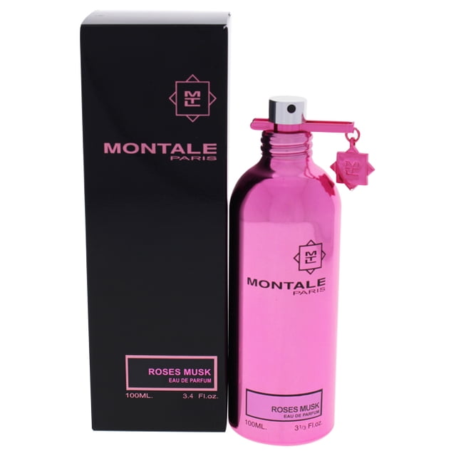Montale Roses Musk Eau de Parfum pour Lui/elle 100 ml, Présentant une Bouteille Métallique rose Vif avec un Breloque Assortie et une Buse de Pulvérisation, Exposée à Côté de Son Élégant Emballage Noir. Ce Parfum floral Boisé Musc Comprend des notes de rose, Musc, patchouli, Vétiver, Ambre et Jasmin.