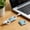 bleu, variante sur Skimsklo Organiseur de Câbles en Cuir en Forme de Cœur - Enveloppe Portable pour Cordon d'Écouteurs pour Écouteurs, Câble de Chargement, Protecteur de Cordon de Données Usb - Gestionnaire de Fils à Fermeture à Pression pour Voyage, Maison, Bureau, Pochette, Sac à Main - 1