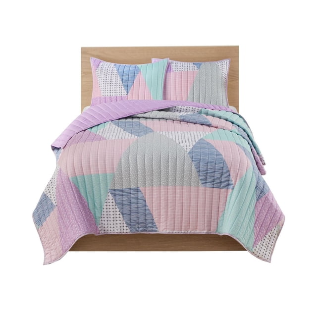Mainstays Kids River 3 Piece Quilt Set Twin/Double with pastel geometric print in lavender, pink, mint, blue, and gray, featuring vertical channel quilting and a solid lavender reverse, includes one quilt and two pillow shams on a wooden bed frame, machine washable and ideal for layering or lightweight use.