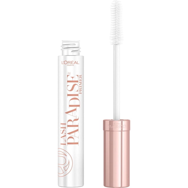 L'Oréal Paris Voluminous Lash Paradise Primer in a white tube with rose gold lettering and cap, featuring a white wavy brush applicator designed for lash conditioning and preparing lashes for mascara application.
