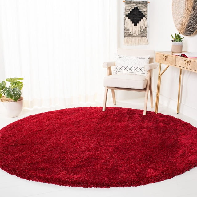 Safavieh Milan Harlow Tapis Shag Uni Rouge, Rond de 3 Pieds avec Fils Synthétiques Pelucheux de 2 Pouces d'Épaisseur, Placé dans une Pièce Contemporaine avec un Fauteuil beige avec Coussin à Motifs, Bureau en Bois et Déco Murale, Idéal comme Tapis d'Accent pour la Déco Maison Moderne.