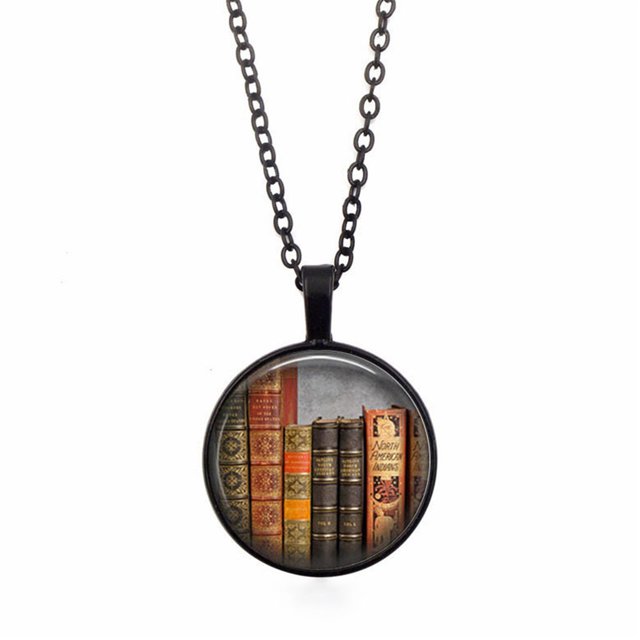 Vintage Library and Books Time Fashion Silver Necklace Pendant Jewelry with a circular pendant showcasing a detailed design of colorful vintage books under a glossy finish. The pendant is attached to a black alloy chain measuring 45cm in length, with the pendant itself measuring 5cm. Ideal as a pendant necklace for everyday wear or as a unique gift.