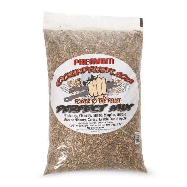 CookinPellets 40lb Perfect Mix Granules Comprenant un Mélange de Bois Franc hickory, cherry, hard maple et apple. le Sac en Plastique Transparent Mettant en Valeur les Granules de Bois de Qualité Supérieure à l'Intérieur, avec une Étiquette Audacieuse Affichant le Nom de Marque, les Détails du Produit et l'Expression « Power to The Pellet. » Idéal pour le Gril et le Fumage, Ces Granules de Bois Franc 100 % Offrent une Saveur Fumée Riche et Authentique pour les Viandes et les Légumes. le Sac Est Conçu pour les Amateurs de Cuisine