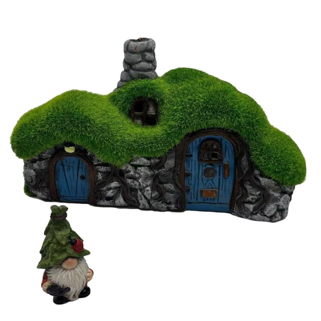 Angelo Décor Gnome Home with solar light and Gnome Statue featuring a moss-covered stone cottage with two blue doors, a stone chimney, and a solar-powered light above the smaller door. Includes a small gnome statue wearing a green tree-shaped hat holding a red bird, ideal for garden or porch decoration in Canadian outdoor living spaces.