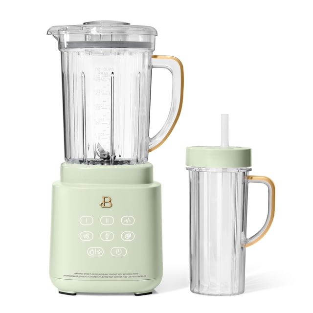 Beautiful by Drew Barrymore PowerExact Blender System in pastel green with a 50oz BPA-free Tritan jar and gold-accented handle, featuring a touch-activated illuminated control panel with three speeds and four presets, plus a 20oz BPA-free single-serve cup with no-drip sippy lid suitable for smoothies and soups.
