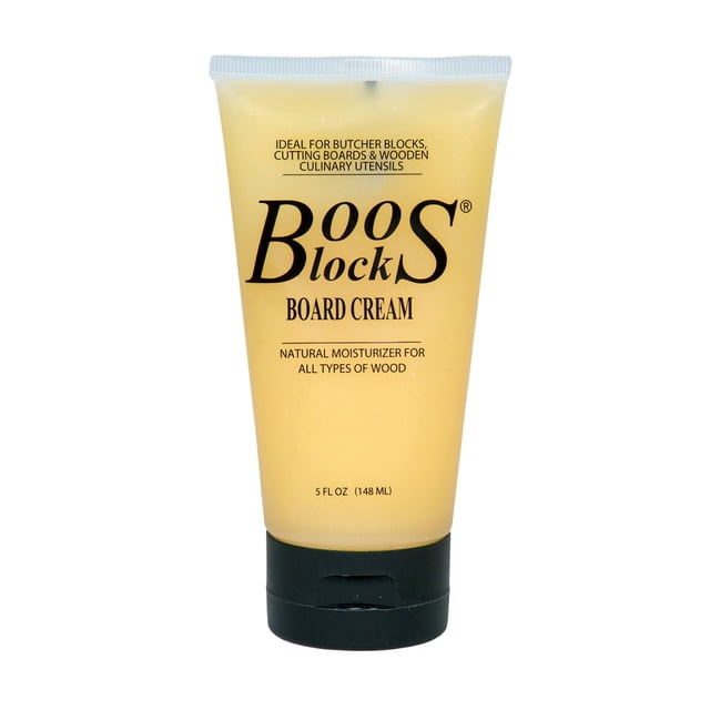 John Boos 5 Oz Boos Block Board Cream for Wood Kitchen Cutting Boards, shown in a 5-ounce tube with a black cap. The cream is designed to protect and revitalize wooden surfaces like cutting boards, bowls, and utensils. Made from unbleached beeswax and food-grade mineral oil, it prevents drying, splitting, and cracking. Safe for food-preparation surfaces and ideal for monthly use, especially in dry climates.