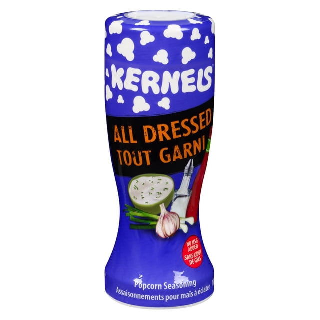 Kernels Assaisonnement pour Maïs Soufflé « All Dressed Up » dans une Bouteille shaker en Plastique Bleue Décorée de Formes de Maïs Soufflé Blanc et de Texte orange Bilingue, Présentant des images de Crème Sure, d'Ail, d'Oignons Verts et de sauce Piquante, Conçu pour Ajouter une Saveur Acidulée et Savoureuse au Maïs Soufflé et aux Collations.