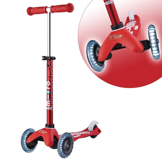 Micro Kickboard Mini Deluxe Trottinette pour Enfants à DEL Rouge, Conçue en Suisse pour les Tout-Petits et les Enfants de 2 à 5 Ans. Dotée de Trois Roues, d'Une Fonction d'Inclinaison pour Diriger, d'Une Barre en T Réglable et de Roues Lumineuses à DEL Activées par le Mouvement. Légère et durable avec une Limite de Poids de 50 kg. Aucun Assemblage Requis.