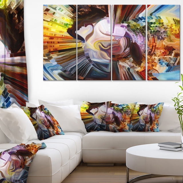 Design Art Layers of Inner Paint Canvas Print featuring a five-panel gallery wrapped canvas with abstract swirling geometric patterns in vibrant yellow, orange, blue, and purple hues, displayed above a white sectional sofa with matching decorative pillows, suitable for modern home décor and wall art.