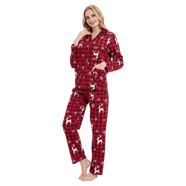 GLOBAL Women's Flannel Pajama Set in a red and black plaid design with white reindeer and snowflake accents. This long sleeve sleepwear set includes a button-down top with a notched collar and pockets, paired with drawstring waist pants. Made from 100% cotton flannel for warmth and comfort, perfect for winter nights in Canada.