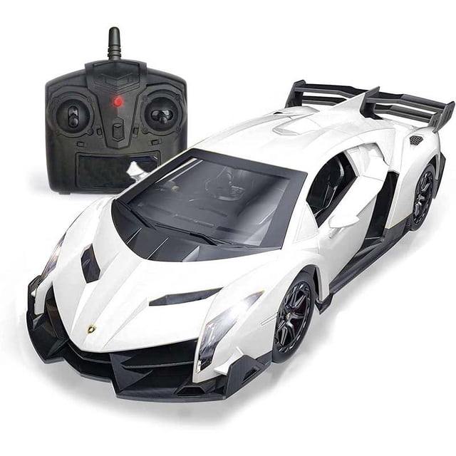 866-2425 - Lamborghini Veneno Radiocommandée en Couleurs Assorties, Affichée dans une Finition Blanche avec un design Détaillé et Aérodynamique. la Voiture RC Comprend des Fenêtres Transparentes Mettant en Valeur des Détails Intérieurs comme des Sièges d'Auto et un Volant. Elle Offre une Fonctionnalité Complète de Télécommande pour les Mouvements vers l'Avant, vers l'Arrière, à Gauche, à Droite et avec Arrêt. les Phares s'Illuminent pendant le Mouvement vers l'Avant, et les Fe