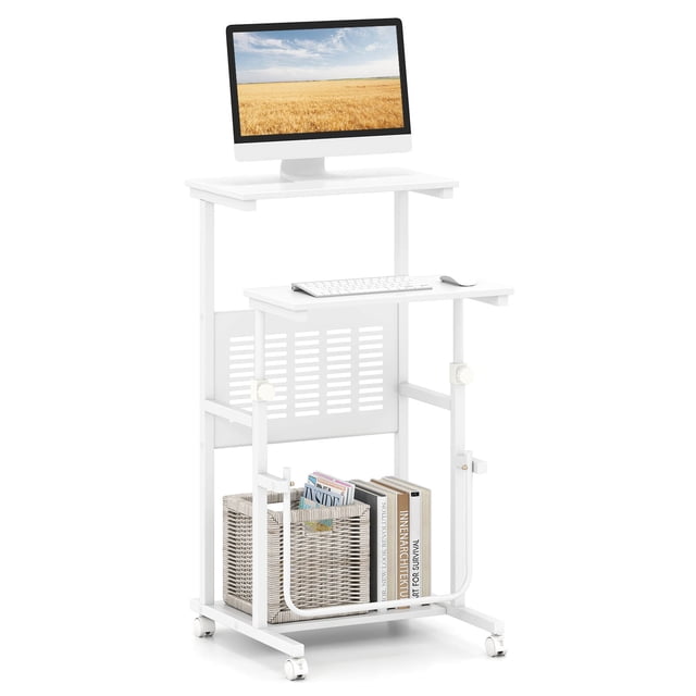 Costway Mobile Stand Up Desk Height Adjustable Computer Standing Desk with wheels & Footrest in white. The desk features a fixed tabletop for stable laptop support and an adjustable tabletop for optimal screen positioning. It includes a U-shaped footrest for added comfort, a protective mesh panel to prevent items from falling, and a bottom shelf for storage. Equipped with four universal wheels, two of which are lockable, for easy mobility and secure placement. Made of MDF and metal, it supports up to 185 lbs and adjusts in height from 26.5 to 40 inches.
