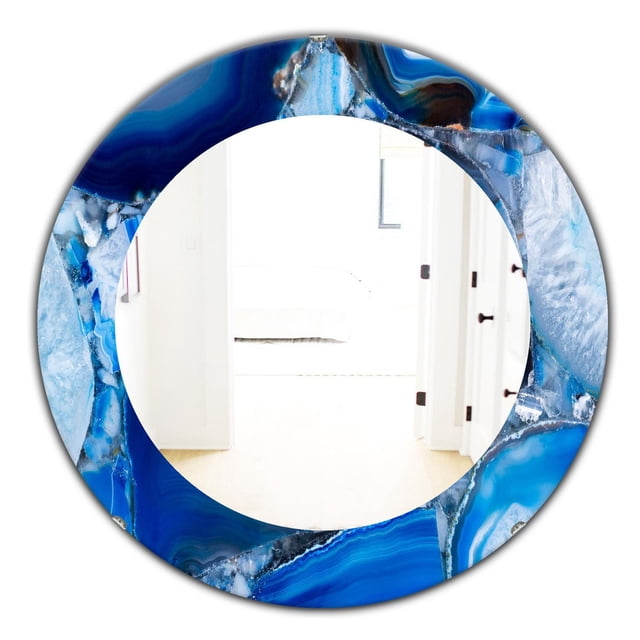 Designart 'Marbled Geode 11' Mid-Century Mirror - Round Wall Mirror - 24x24 with a blue marbled geode frame and crystal-clear reflective surface showing a bright white hallway interior, ideal for enhancing space and light in home décor.