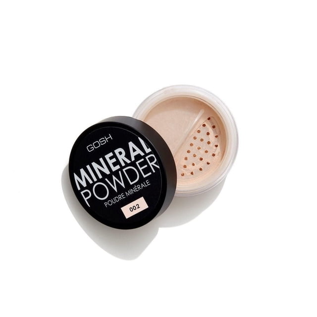 GOSH - Mineral Powder - 002 Ivory loose powder container with black lid labeled with brand and shade, showing light beige mineral powder with sifter holes, offering medium to full coverage and a natural matte finish with a light, silky texture suitable for setting makeup.