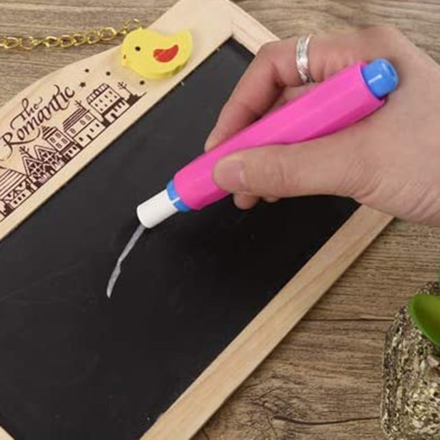 EGNMCR 5PC Non-dirty Hand Plastic Chalk Cover Chalk Clip for Teaching shown in use. A pink and blue chalk cover holds white chalk, writing on a small blackboard with a wooden frame. Ideal for school supplies, chalkboards, and reducing chalk dust. Fits chalks with diameters of 8mm to 10.3mm, protecting hands and clothes.