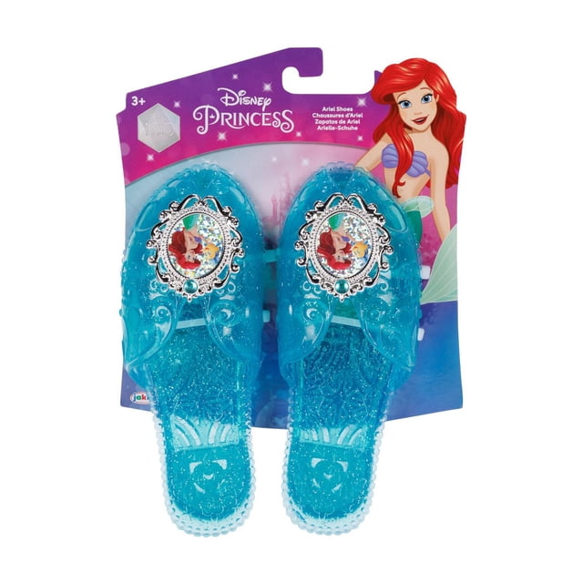 Disney Princess Ariel Shoe featuring blue translucent jelly dress-up shoes with glitter and silver-tone Ariel cameo embellishments on each shoe, displayed on purple Disney Princess branded packaging for children ages 3 and up.