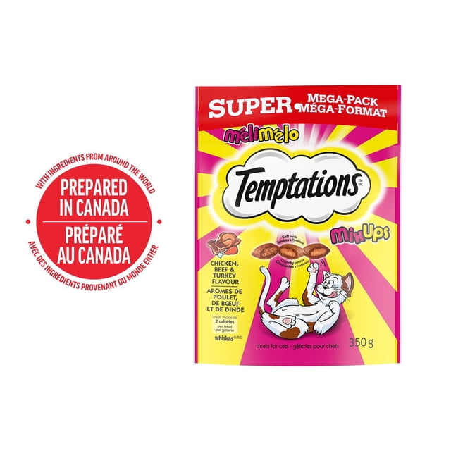 Temptations MixUps Chicken, Beef & Turkey Flavour Soft & Crunchy Cat Treats 350g super mega-pack pouch with bright pink and yellow sunburst design, featuring a playful white and brown cat and bilingual text highlighting Canadian preparation and dual texture treats with under 2 calories each, suitable for daily feeding or meal mix-ins.