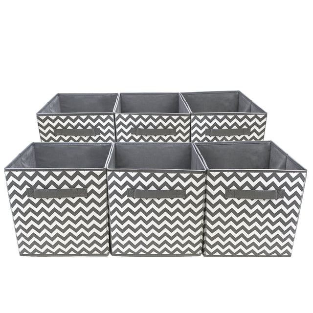 Sorbus Foldable Storage Cube Basket Bin, 6 Pack, Chevron Pattern (Gray). A set of six collapsible storage cubes with a gray and white chevron pattern, featuring sturdy side handles for easy transport. Each cube measures approximately 10.75 inches in length, 11 inches in height, and 10.75 inches in width. Made of lightweight, durable nonwoven polypropylene and cardboard, these bins are ideal for organizing household items such as toys, clothes, books, and seasonal decorations. Designed to fit cube storage organizer shelves and fold flat for convenient storage.