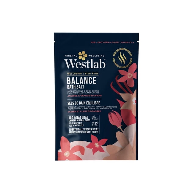 WESTLAB BALANCE BATH SALTS 1KG resealable pouch with navy blue background and pink floral accents, formulated to support women's wellbeing during PMS, pregnancy, and menopause with jasmine and orange blossom scent, containing 100% natural mineral salts, magnesium, and mood-boosting neuro scent for mind and body balance.