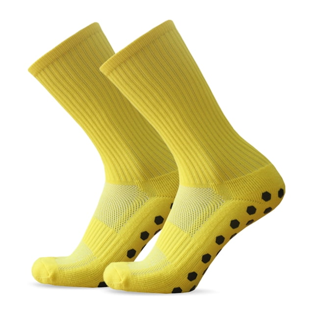 Graflsoa Hexagon Grip Soccer Socks in yellow, featuring a breathable polyester blend with spandex and PVC for comfort and performance. These socks have anti-slip hexagon grip particles on the bottom, a ribbed elastic cuff for a secure fit, and moisture-wicking properties. Designed for sizes 38-44, they provide cushioning and support for soccer players.
